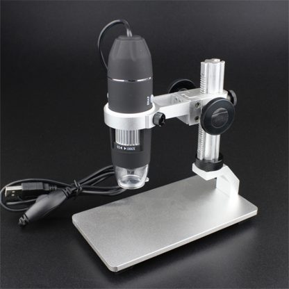 microscope with liftable holder